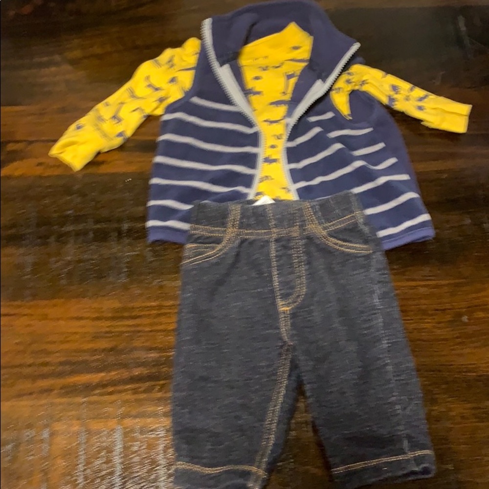 Safari wild animal vest and blue jeans that